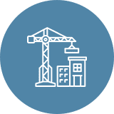 Crane and building icon on blue circle.